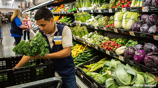 walmart employee stocking greens